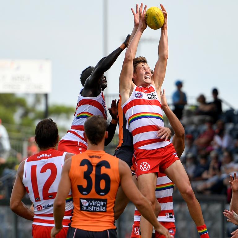 Jordan Dawson flies for a mark against the Giants. Picture: AAP Image/Dan Himbrechts