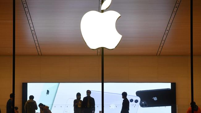 A steep drop in iPhone sales cut Apple's profit by 7 per cent to $US12.7bn, the company announced October 29, 2020. (Photo by GREG BAKER / AFP)