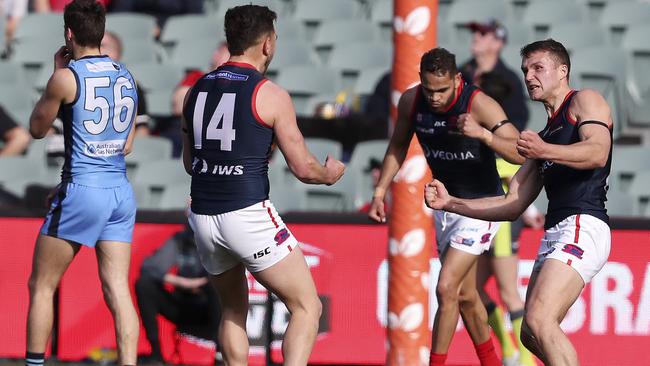 Redlegs’ Peter Bampton celebrates with teammate Matthew Nunn. Picture: Sarah Reed