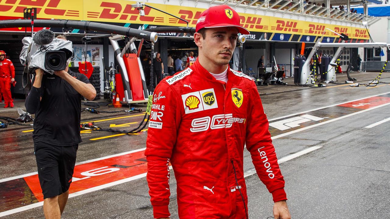 Nowhere to hide: Leclerc walks back to pits after failing to complete the race at the Hockenheimring.