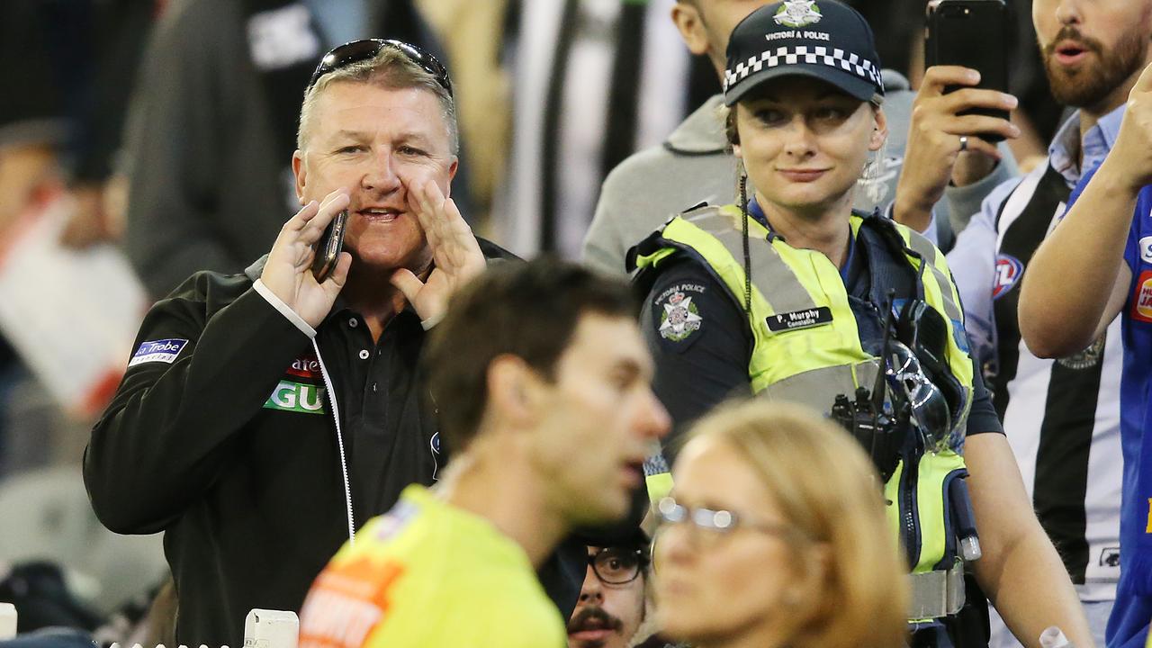 A Magpies fan abuses the umpires at half time. Photo: Michael Dodge/Getty Images