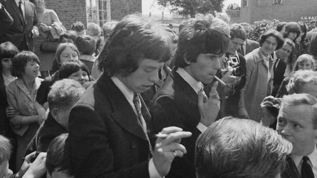 Jagger and Richards outside the magistrates court in Chichester, West Sussex, in May 1967. Picture: Hulton Archive, Getty Images