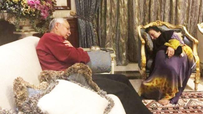 Rosmah and deposed PM slumped during ‘humiliating’ raid which could see Najib Razak go to prison.