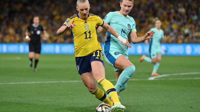 Stina Blackstenius of Sweden is fouled by Clare Hunt of Australia during the Saturday run-off. Picture: Justin Setterfield/Getty Images