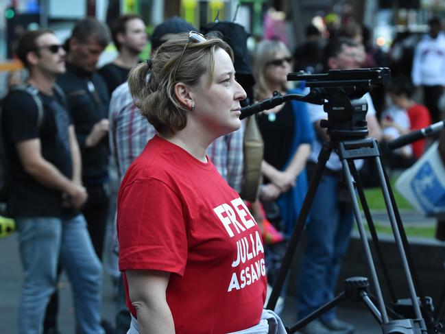 Supporters of WikiLeaks founder Julian Assange rally outside the Victorian State Library in Melbourne. Picture: AAP