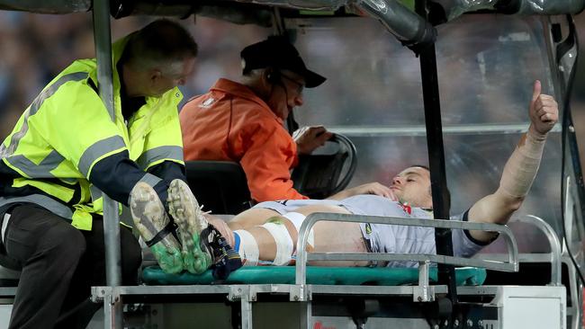 Shaun Fensom gives the thumbs up to the crowd as he is taken off in the NRL grand final. Picture. Phil Hillyard