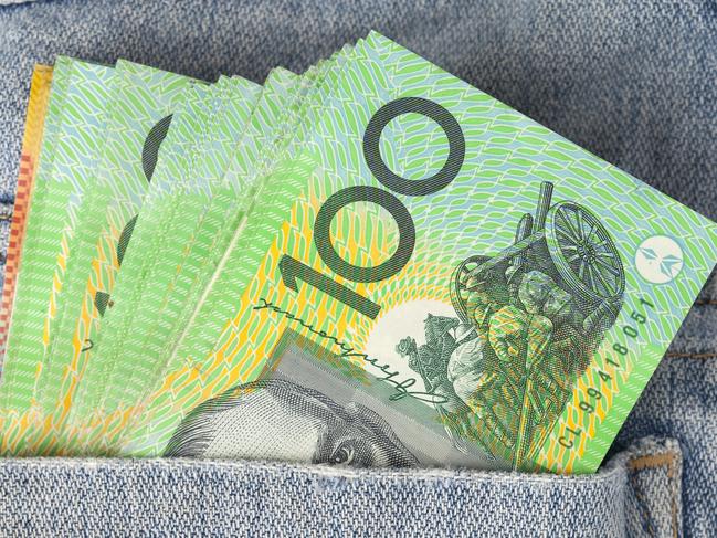 Australian 100 dollar notes in jeans pocket. money, wealthy, rich generic