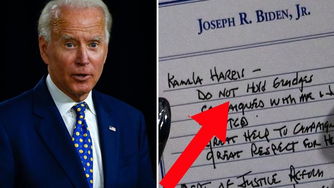 Joe Biden holds a pad with the names of potential running mates on it during a campaign event in his home state of Delaware last week. Picture: AFP