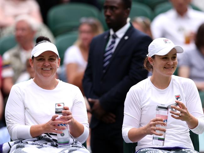 Casey Dellacqua and Ashleigh Barty took centre court at Wimbledon. Picture: Getty Images