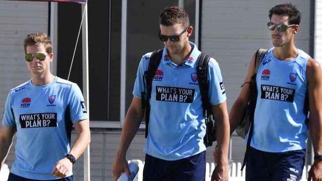 Steve Smith (left), with NSW teammates Josh Hazelwood (centre) and Mitchell Starc (right) at Drummoyne Oval on Tuesday. Picture: AAP 