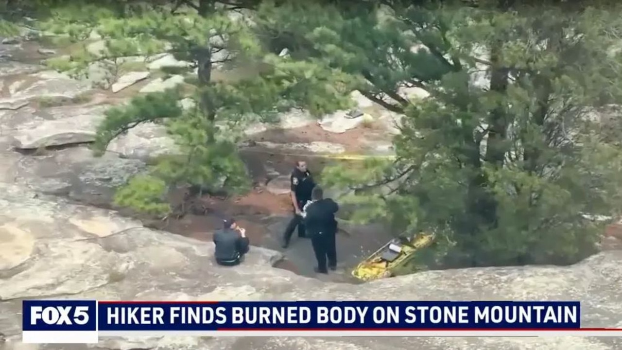 The burned body of a young man was reported by a hiker around on Saturday local time.