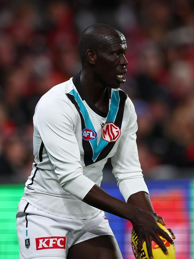 Port Adelaide defender Aliir Aliir is the older brother of Akeech Aliir. Picture: Graham Denholm/AFL Photos/via Getty Images