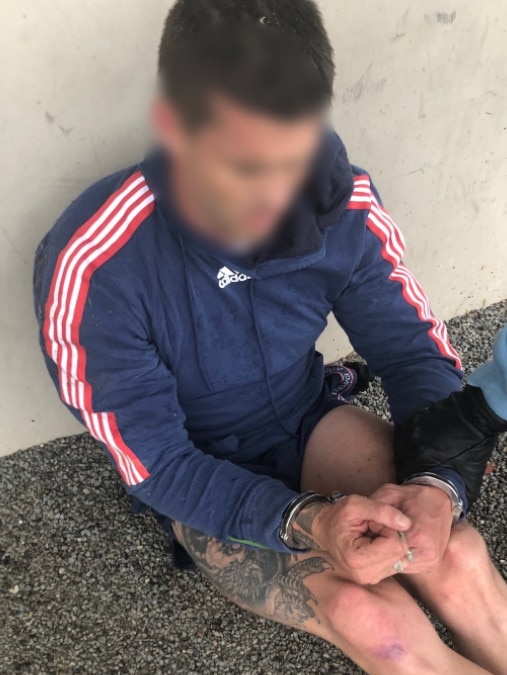 A man who jumped out of a window in an attempt to evade police, has allegedly been found with a kilogram of cocaine hidden in his pants. Credit: NSW Police