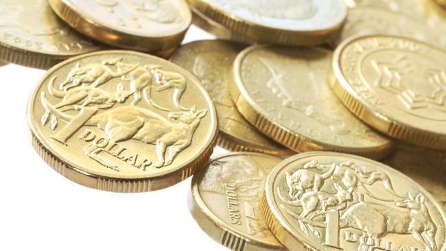 "Australian one dollar and two dollar coins, in macro."