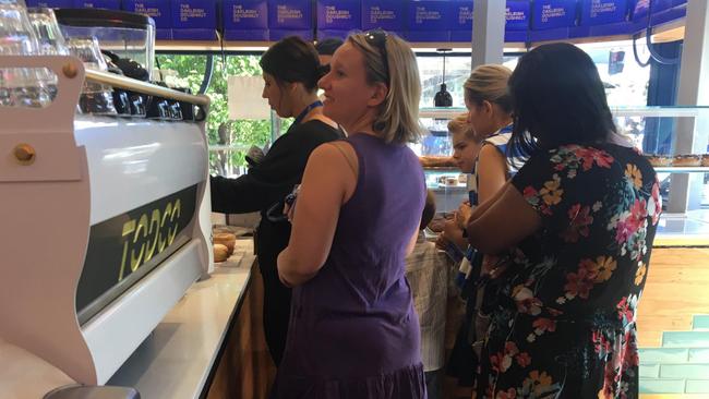 People line up to try the doughnut ice cream cones at Oakleigh Doughnut Co.