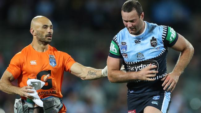 Boyd Cordner is helped from the field after suffering yet another head knock