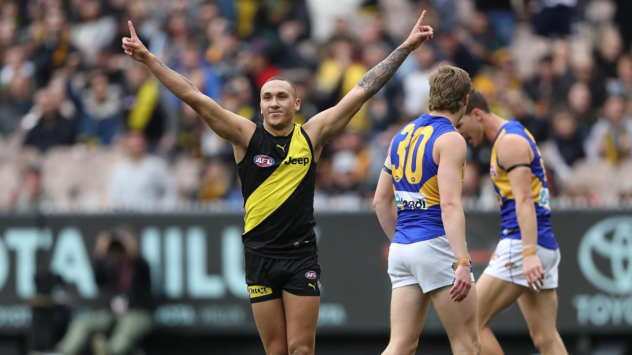 Shai Bolton celebrates a goal against West Coast in Round 22.