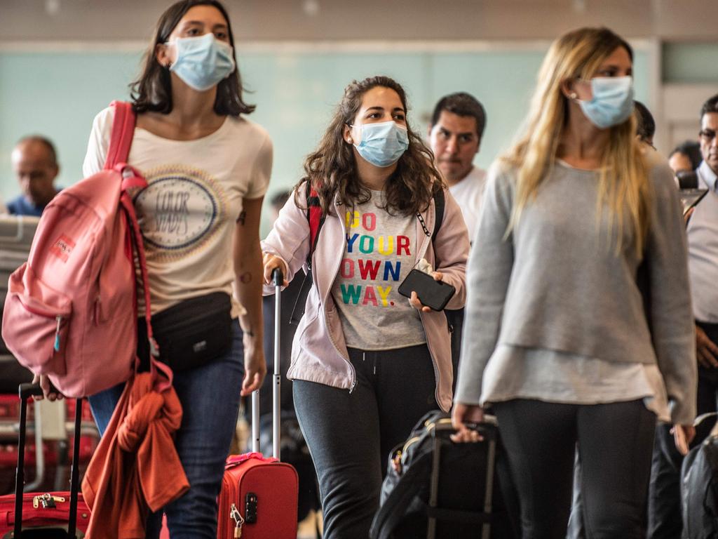 Passengers in Peru wearing masks despite no record of cases there. Picture: Ernesto BENAVIDES / AFP.