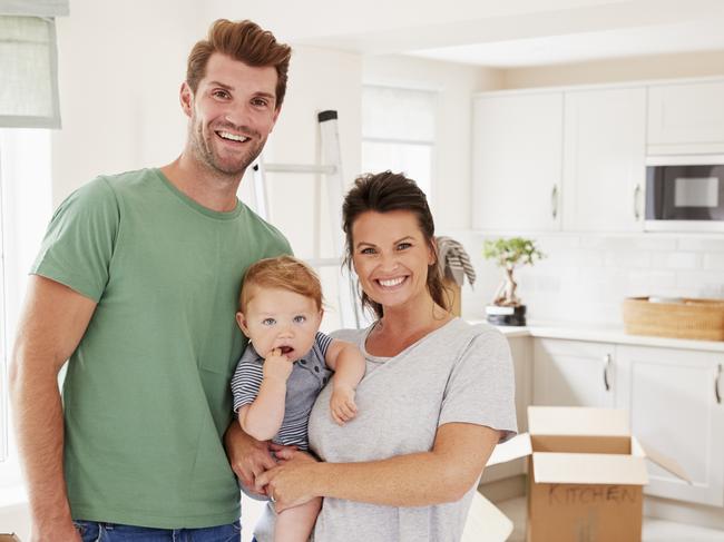 A young couple have just moved into the first home and have signed up to a new mortgage. Picture: iStock.