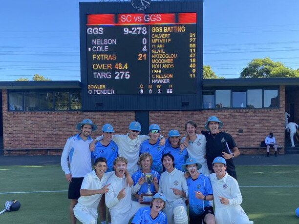 Geelong Grammar players celebrate their win over Scotch College.