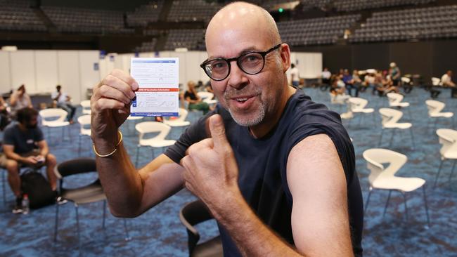 Tourism worker Marcus Brady was vaccinated against the Covid-19. The tourism industry is hoping more Queenslanders will roll up their sleeves so the region can open up to the rest of Australia. Picture: Brendan Radke