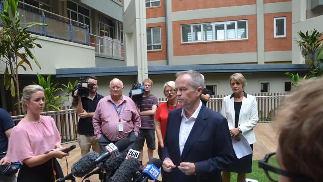 Bill Shorten addresses the media at the Cairns Hospital with Cairns and Hinterland Hospital and Health Service chairman Clive Skarott, Labor candidate for Leichhardt Elida Faith and Senator Kristina Keneally in the background. PICTURE: CHRIS CALCINO