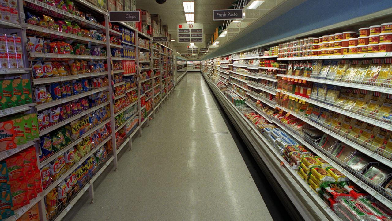 Tall, dark, narrow and extremely long aisles are common in Australian supermarkets.