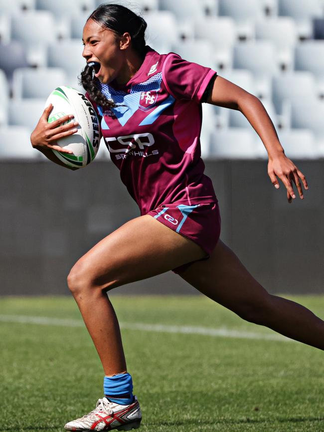 The Hills Sports High player makes a break before scoring a try against Erindale Sports Academy for the NRL Schoolgirls Cup. Picture: Adam Yip