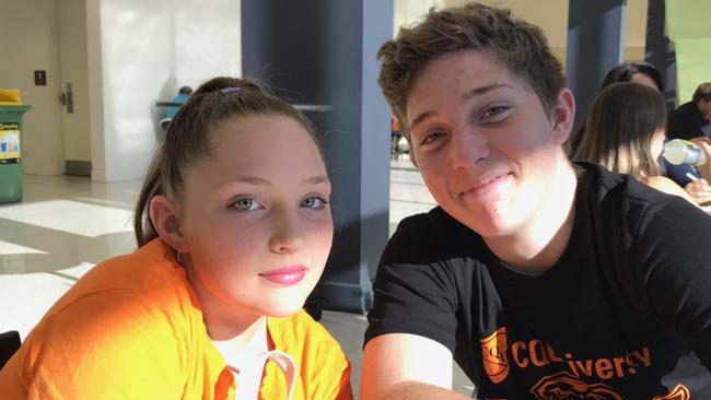 Declan Laverty with his sister Bridget Laverty before a Cairns Taipans game. Picture: Supplied