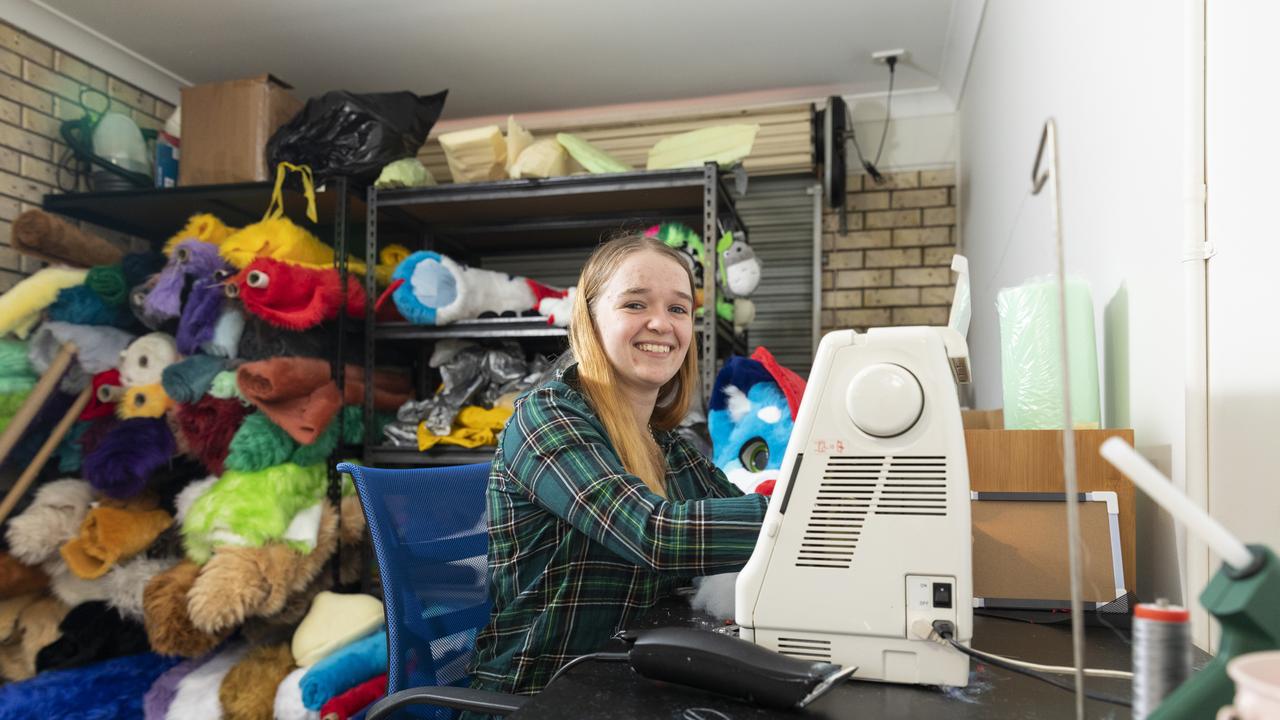 Gabi at her sewing machine in her workshop, preparing fursuits. Picture: Mark Cranitch