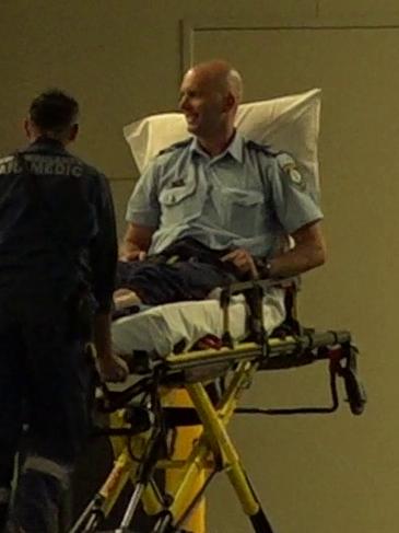 An injured police officer arriving at Nepean Hospital last night. Picture: TNV