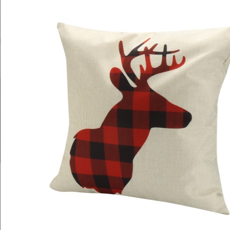 Add a touch of charm to the living room with this cushion. Image: Catch.