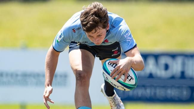 Tom Hartman scores for the Waratahs. Picture: Julian Andrews