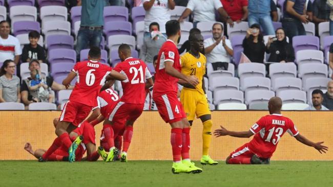 Jordan players celebrate their winning goal.