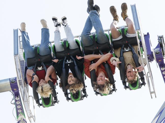 Royal Adelaide Show opens for 2024. Clint 14and Leo 20 Rothi ride The Joker with Reporters Natalie and Jess. 30th August 2024. Picture: Brett Hartwig