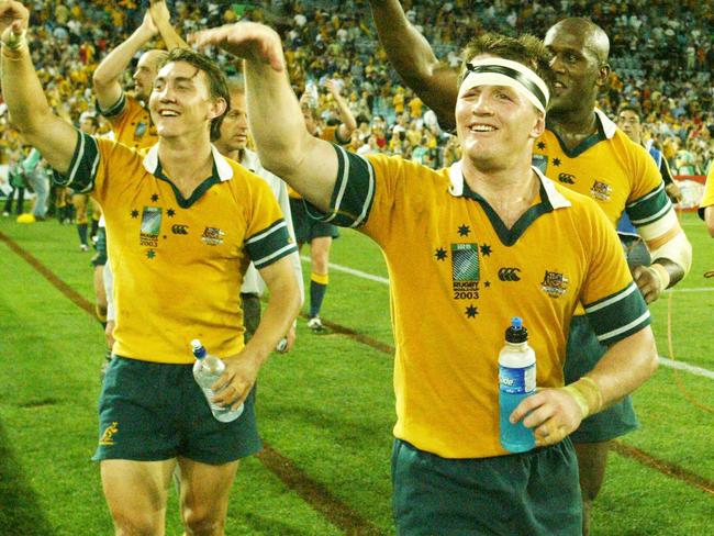 NOVEMBER 15, 2003 : Wallabies' (L-R) Mat Rogers, Elton Flatley and Wendell Sailor at Telstra Stadium in Sydney 15/11/03, following victory in Rugby World Cup (RWC) semi final Australia v New Zealand. Pic Mark Evans.Union