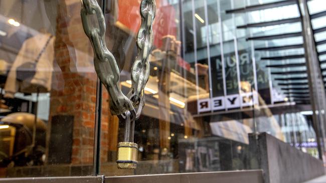 Melbourne’s CBD remains deserted during stage four lockdowns but businesses are looking forward to restrictions easing. Picture: David Geraghty.