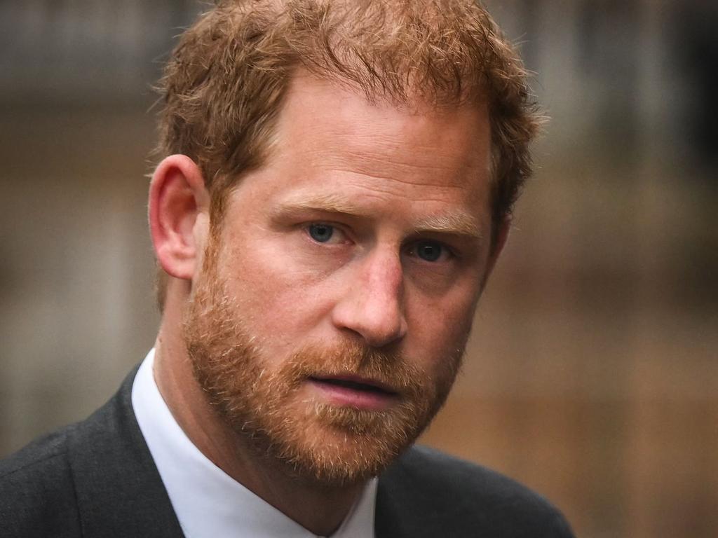 (FILES) Britain's Prince Harry, Duke of Sussex arrives at the Royal Courts of Justice, Britain's High Court, in central London on March 28, 2023. Lawyers for Prince Harry on December 5 began a legal challenge over his security arrangements in the UK, after he quit frontline royal duties and moved to North America.  The case about his loss of UK taxpayer-funded protection is the latest in a string of court proceedings initiated by Harry, whose father is King Charles III. (Photo by Daniel LEAL / AFP)