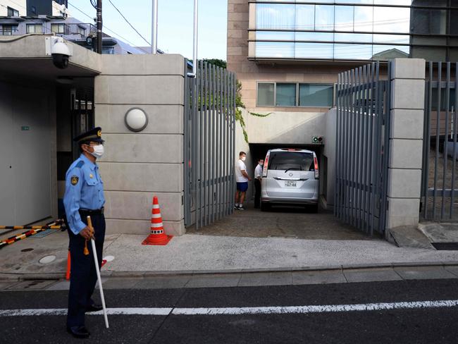 A car arrives at the Polish embassy in Tokyo to reportedly pick up Belarus athlete Krystsina Tsimanouskaya. Picture: AFP