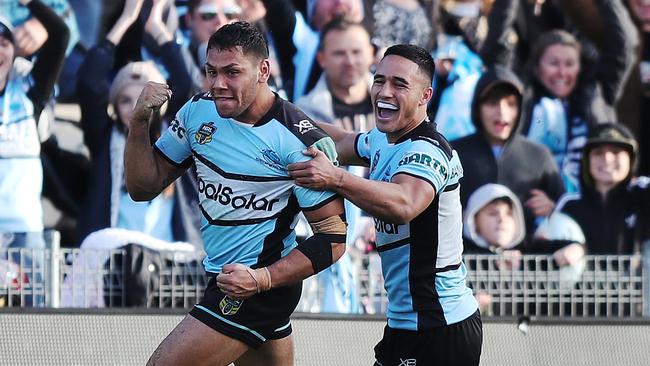 Jesse Ramien celebrates after scoring a try for the Sharks. Picture: Brett Costello