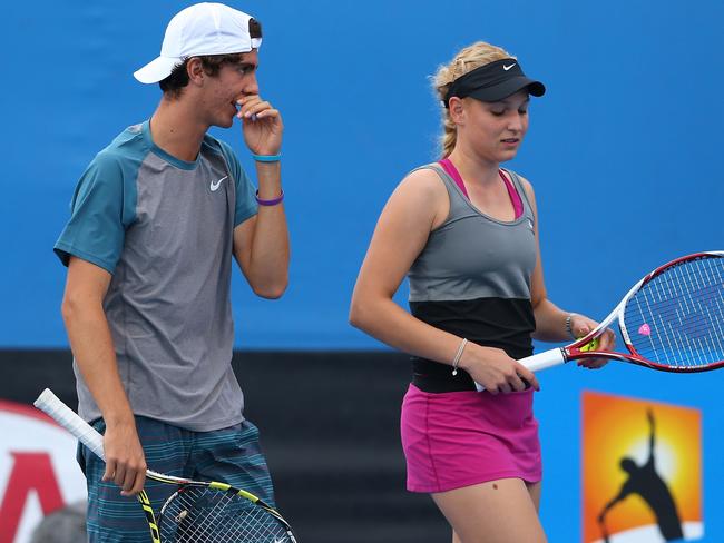 Thanasi Kokkinakis and Donna Vekic playing mixed doubles at the 2014 Australian Open.