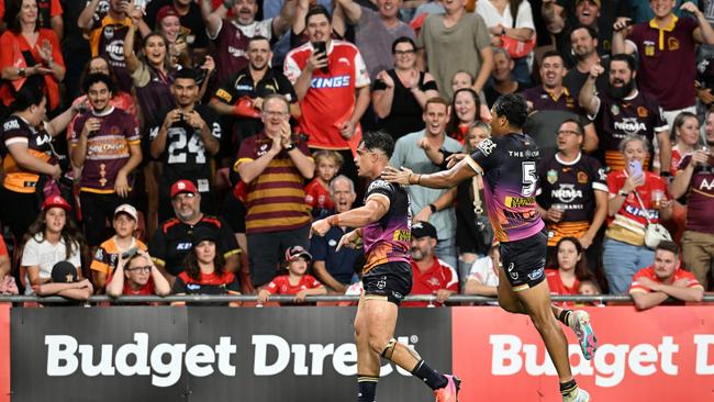 Kotoni Staggs celebrates with Selwyn Cobbo after scoring the match winning try for the Broncos on Friday night. Picture: AAP Image/Darren England