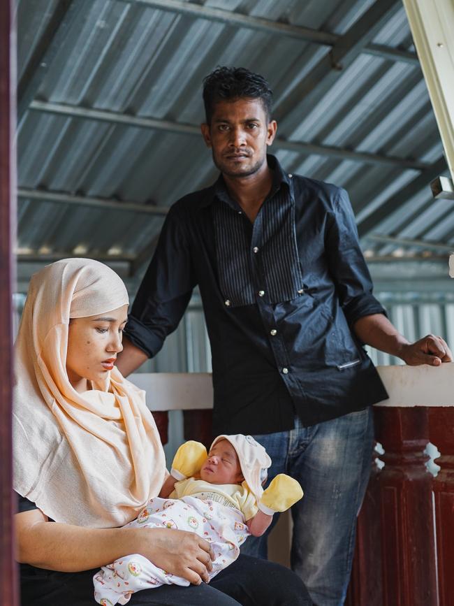 Rashid Mohammed and Taslemah Mohammed with their new born baby boy Rohan. Rashid says coronavirus has devastated the roadside roti business that provided for them. Picture: Piseth Nhem