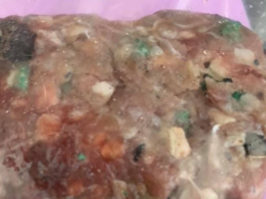 A dog has been poisoned after what appears to be mince laced with green bait pellets was dropped over a back fence. Picture: supplied Balmain Veterinary Hospital