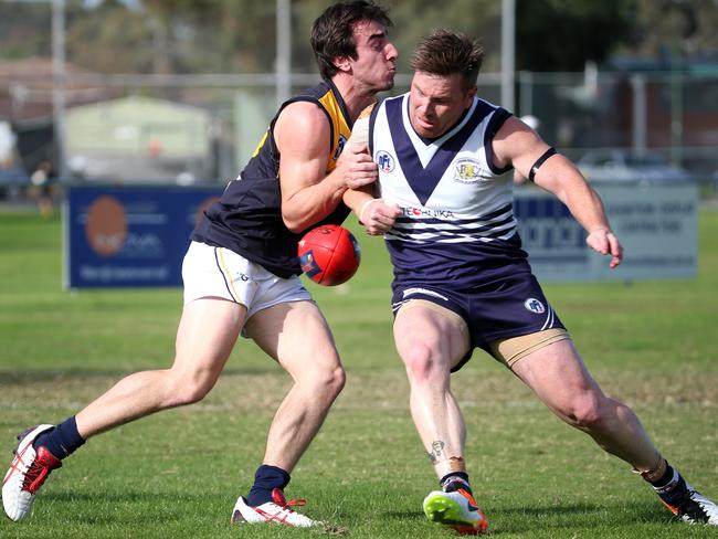 Gary Moorcroft (right) is still going strong for Bundoora. Picture: Mark Dadswell