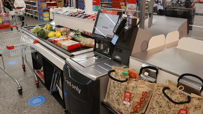 The self serve conveyor belt registers. Picture: Tim Hunter