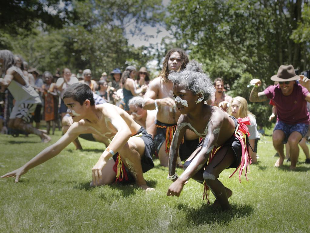 Jinibara emerging dance troupe teach festivalgoers their dances at the Woodford Folk Festival. Picture: Megan Slade/AAP