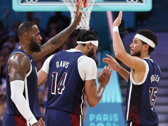 Lebron James and Devin Booker celebrate. Picture: Getty Images