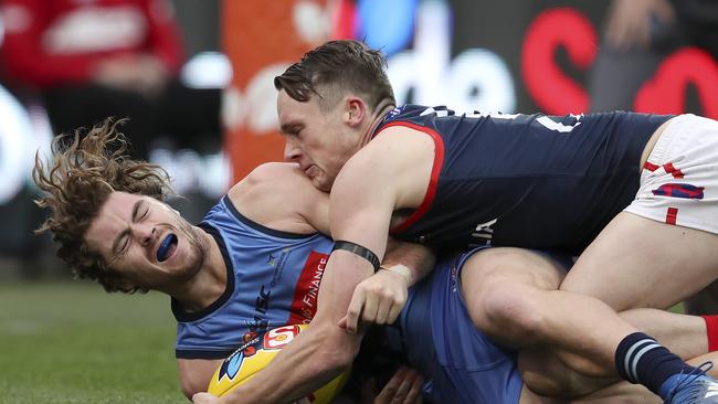 Sturt’s Joshua Hone is put under pressure by Norwood’s Tom Forster in the elimination final at Adelaide Oval. Picture: SARAH REED