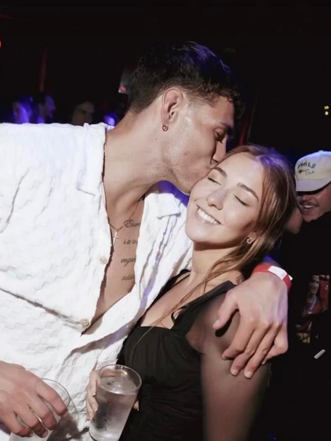 Liam Hampson in the background of a picture taken at a Barcelona nightclub where his body would be found hours later. Jordan Riki, is in the foreground with a woman.